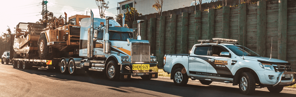 construction equipment transport highlighting sustainable resource use on site